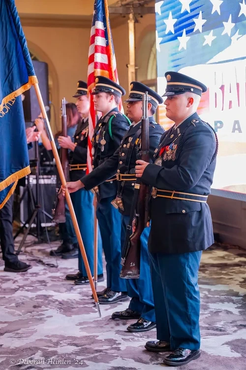 Corporate event photography by Deborah Heinlen Photography, Cincinnati — military color guard presenting flags at a corporate ceremony