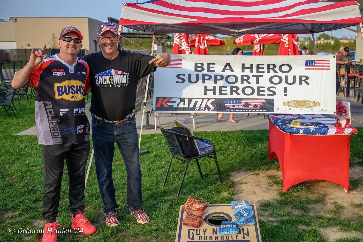 Corporate event photography by Deborah Heinlen Photography, Cincinnati — ACL Pro cornhole player Matt Guy at a Back Home Patriots outdoor charity event