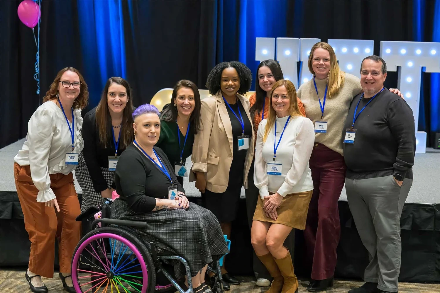 Corporate event photography by Deborah Heinlen Photography, Cincinnati — diverse group of business professionals with name badges at a corporate conference