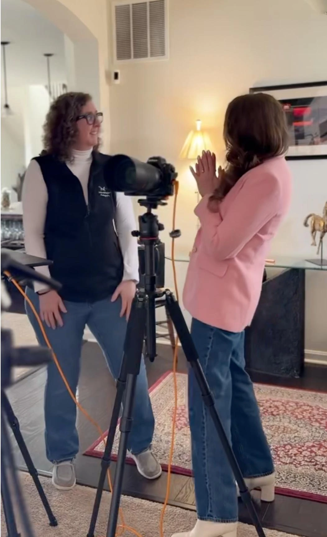 Deborah Heinlen, Cincinnati headshot photographer, coaching a client during a relaxed on-location headshot session